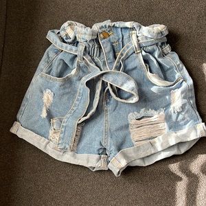 High waisted, distressed shorts
